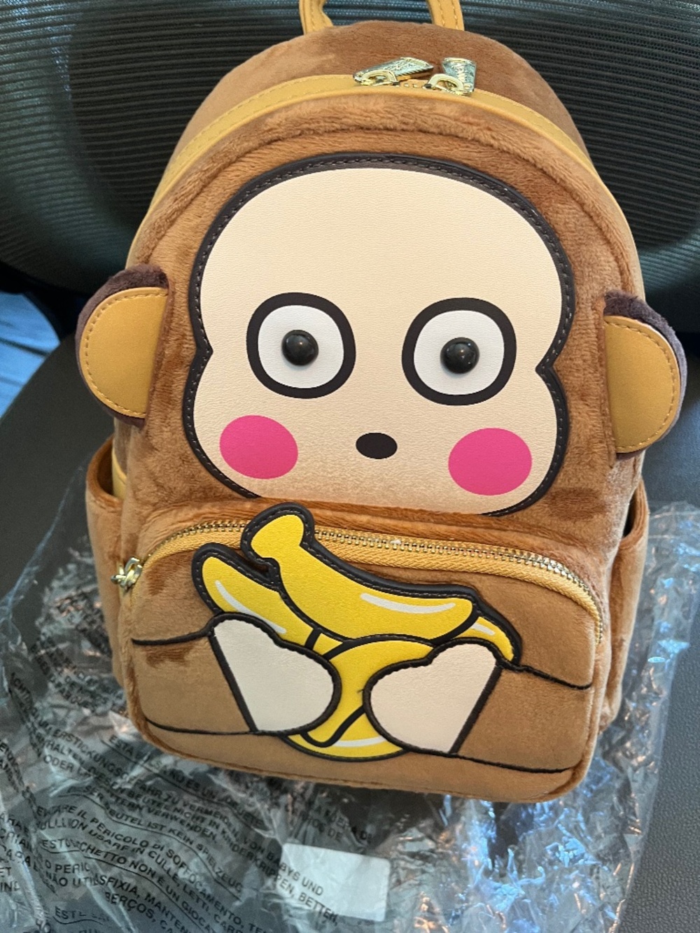 Sanrio monkey loungefly